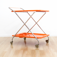 MID CENTURY ITALIAN FOLDING BAR CART IN ORANGE AND CHROME