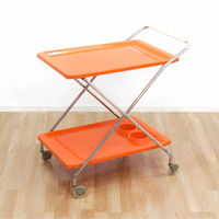 MID CENTURY ITALIAN FOLDING BAR CART IN ORANGE AND CHROME