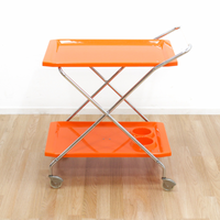 MID CENTURY ITALIAN FOLDING BAR CART IN ORANGE AND CHROME