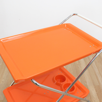 MID CENTURY ITALIAN FOLDING BAR CART IN ORANGE AND CHROME