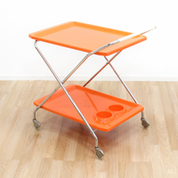 MID CENTURY ITALIAN FOLDING BAR CART IN ORANGE AND CHROME